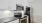White cabinets and black granite kitchen